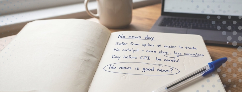 Open trading journal on a wooden desk with handwritten notes under the heading "No news day": safer from spikes is not easier to trade, no catalyst means more chop, be careful the day before CPI.